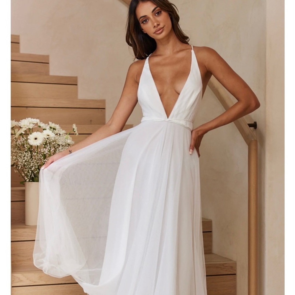 Worn once Selfie Leslie dress. White plunge neckline dress with Tulle skirt.